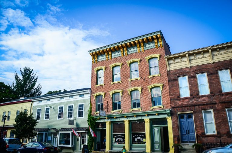 a building with a sign on it, Hudson