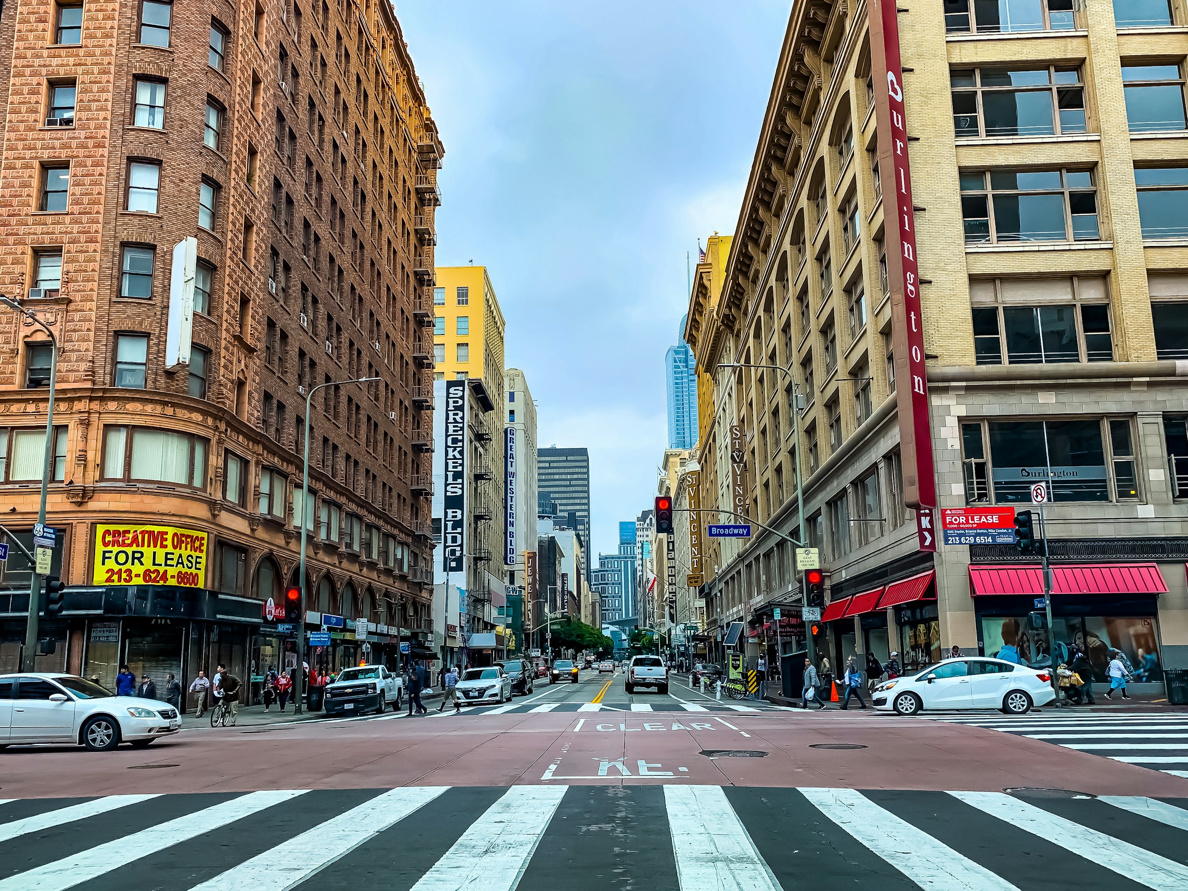a city street filled with tall buildings, Los Angeles